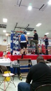 Boxers training in the ring during a boxing class at Villa Park Boxing Club.