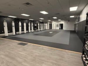 Kickboxing training area with punching bags at Turbo Kickboxing Academy.