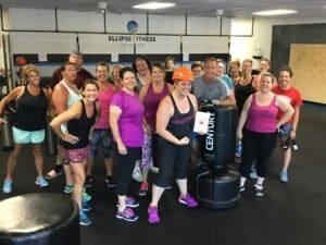 Group of women and men in fitness class at Ellipse Fitness St. Louis.