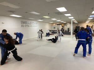 Students practicing Brazilian Jiu Jitsu at Emerald Coast Jiu Jitsu Academy.