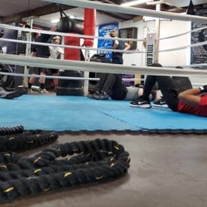 Boxers training in the ring at Goody's Boxing Club gym.