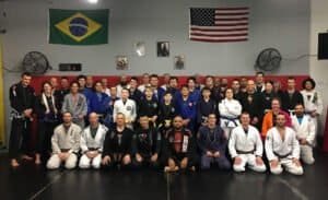 Group photo of students and instructors at Marietta Combat Sports BJJ class.