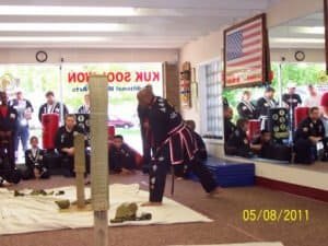 Martial arts instructor demonstrating techniques at Sah Doh Kuk Sul Peoria class.