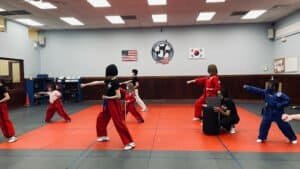 Children practicing martial arts in a class at Life Champ Martial Arts of Woodbridge.