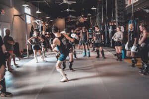 Muay Thai fighters practicing techniques in Tampa gym.