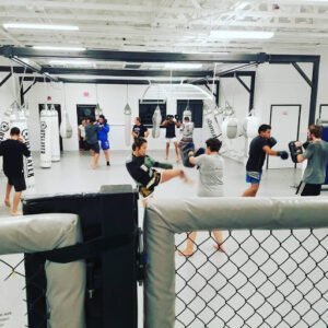 Students practicing boxing and MMA techniques at Ramona BJJ & MMA center.