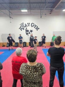 Group of people attending a self-defense class at The Krav Gym.
