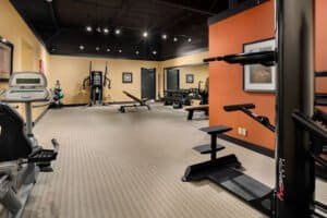 Well-equipped gym with cardio, strength, and functional training equipment.