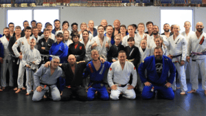 Group of martial artists in gi uniforms at Risen Jiu-Jitsu Terre Haute.