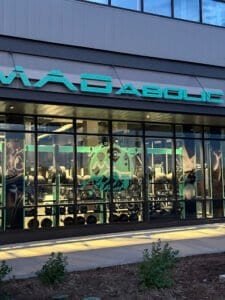 Exterior view of MADabolic Westminster fitness center with gym equipment visible.