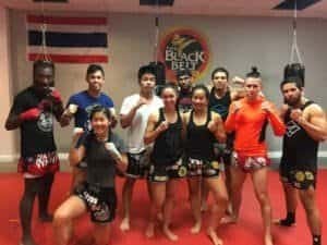 Group of Thai boxing fighters in training at The Black Belt gym.