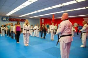 Martial arts students lined up during training at USTA Smokey Point dojo.