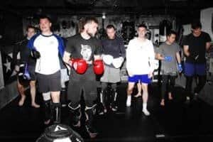 Group of fighters training in boxing gym at Diamond Dogs MMA.