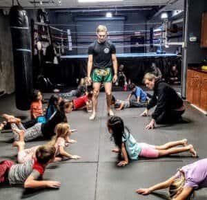 Children participating in martial arts training at Black Label Martial Arts gym.
