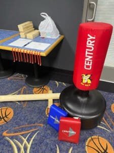 Century boxing punching bag and training gear at J.D. Karate & Fitness.
