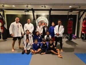 Group of students and instructors at California Combat Club Jiu-Jitsu training.