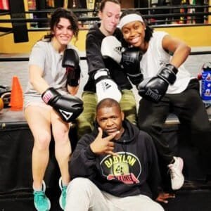 Group of women boxers training together at Team Mack Fitness gym.