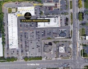Aerial view of B In Action Academy and parking lot on 12 Mile Rd.
