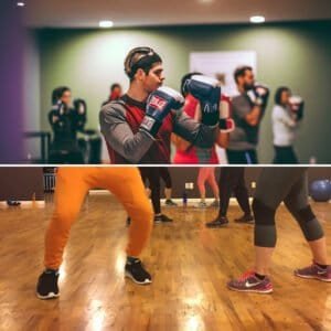 Group of people practicing boxing in a gym with focus on a young woman.