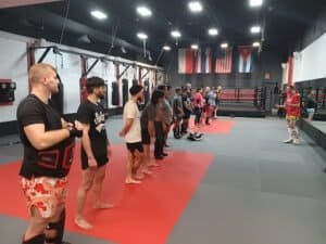 Group of fighters in a Thaiboxing class at Rebel Thaiboxing gym.