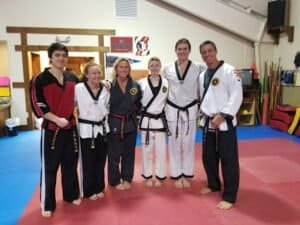 Group of karate students and instructor at Pak's Karate Academy in Fernandina Beach.